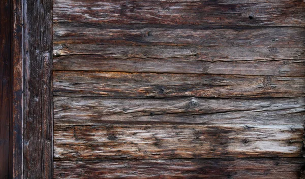 Pogodowane Stare Tło Tekstury Drewna Fasada Drewniany Dom Miejscowości Alpach — Zdjęcie stockowe