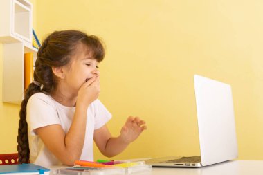 Online Preschool Classes. Excellent online learning for kids. Happy schoolgirl learning online.