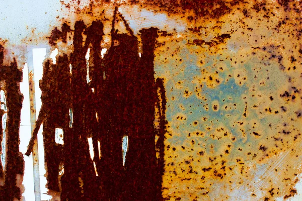 Ржавый металл с оранжевым, коричневым и синим цветом — стоковое фото