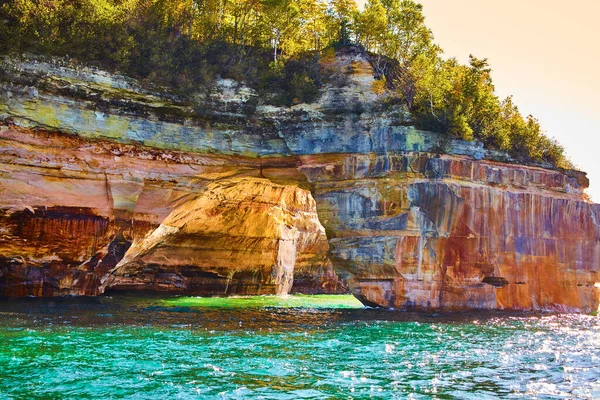Pictured Rocks with tunnel through the cliff — Stock Photo, Image