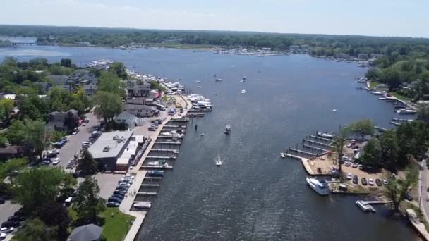 Aerial port lake filled with docks and boats — Stock Video