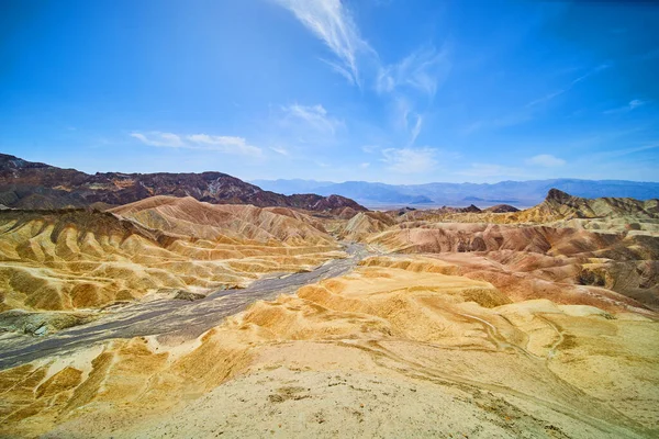 Image of Breath taking view of desert landscape with colorful sediment formations