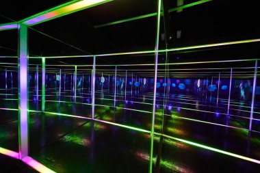 Image of Mesmerizing hallway of mirrors and lights