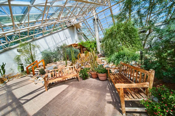 Image of Benches along path in desert greenhouse biome