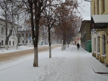 winter snow-covered impassable street on city