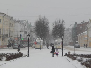 winter snow-covered impassable street on city