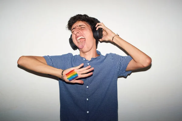 Cheerful Gay Man Rainbow Pride Flag Listening Music — Stock Photo, Image