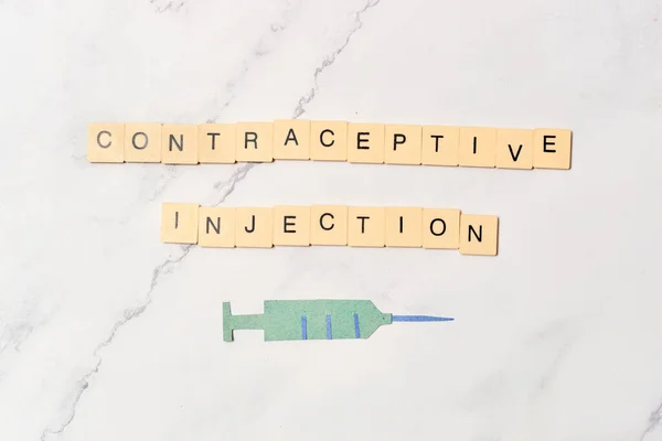 Injection, contraceptive method concept and sexual education.