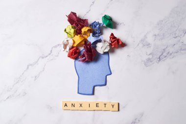 Paper craft representing anxiety and mental disorders. Concept of mental health 