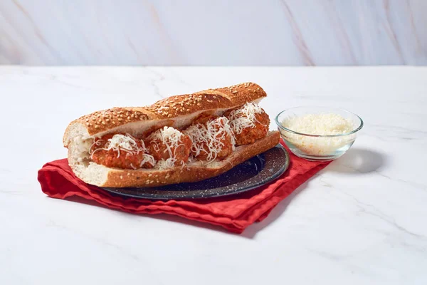 Meatball sub sandwich with cheese and marinara tomato sauce. american italian fast food