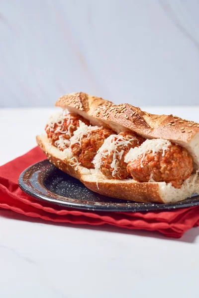 Meatball sub sandwich with cheese and marinara tomato sauce. american italian fast food