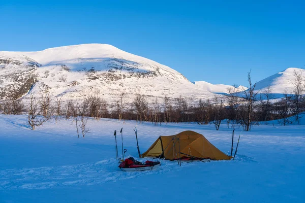 A tent pitched in the snow near the famous Kungsleden.