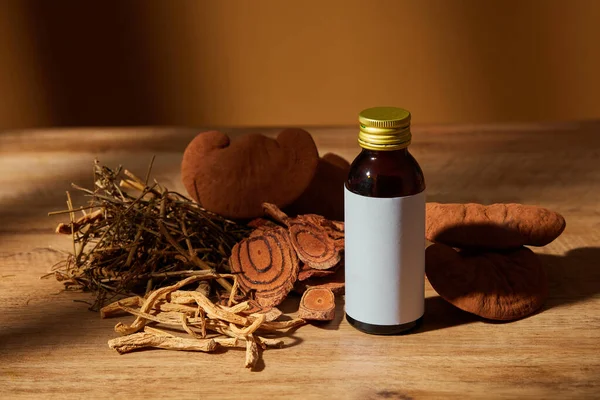 Traditional chinese medicine with herb and spices in brown wooden background and medicine jar , for medicine advertising , photography traditional medicine content