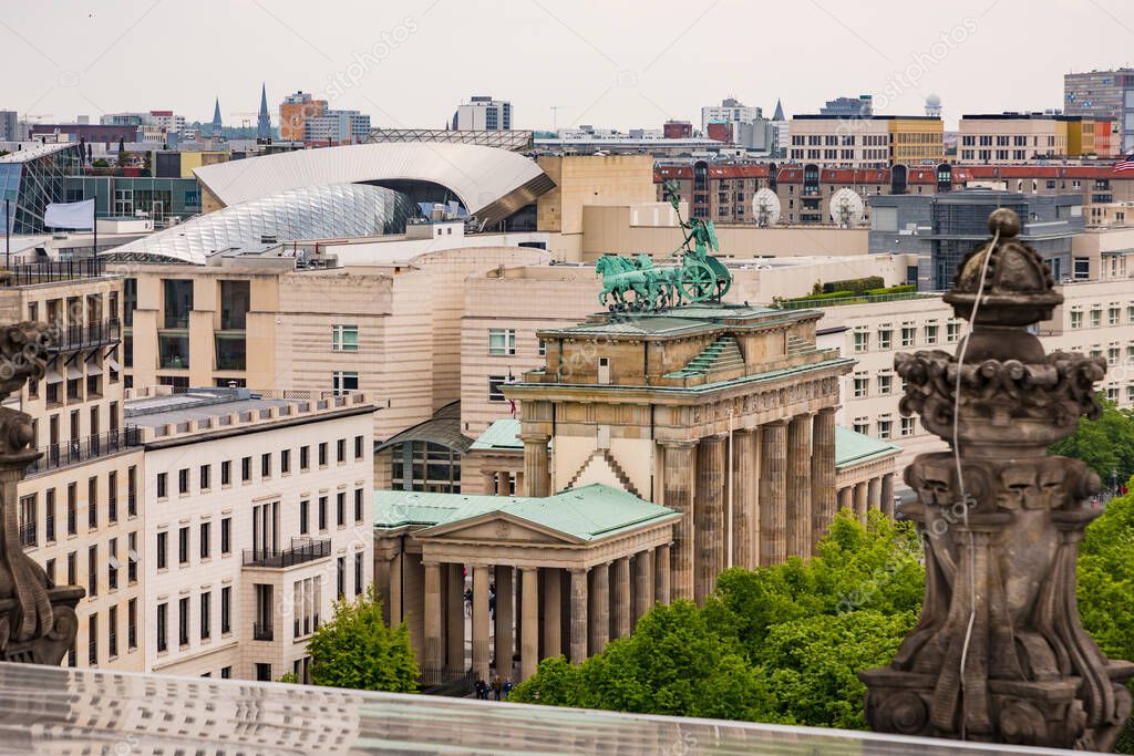 Brandenburger Tor at Pariser Platz seen from Reichtag with cityscape of Berlin, Germany