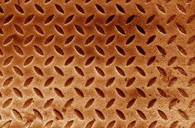 Paslı, paslı, turuncu tonu bulanık bir metal döşeme. Tasarım için soyut arkaplan ve doku.                   