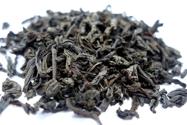 Fehér Alapon Izolált Száraz Tea Homályos Hatással Élelmiszerek Összetevők Háttere — Stock Fotó