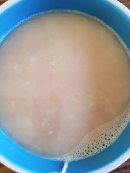 Negro Con Crema Una Taza Azul — Foto de Stock