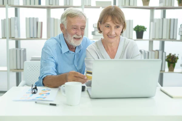 Caucasian Senior People Holding Credit Card Shopping Online Concept Royalty Free Stock Photos