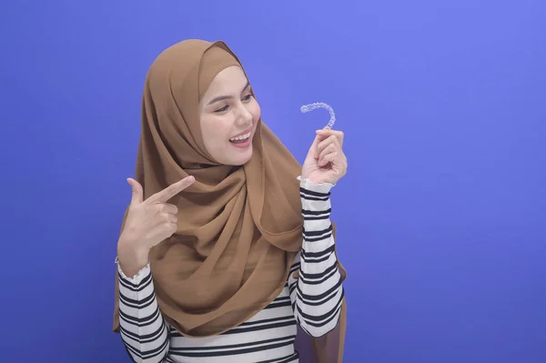Young Muslim Woman Holding Invisalign Braces Studio Dental Healthcare Orthodontic — Stock Fotó