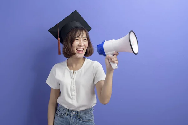 Portrait Graduated Asian Student Holding Megaphone Isolated Purple Background Studio — Stock Photo, Image