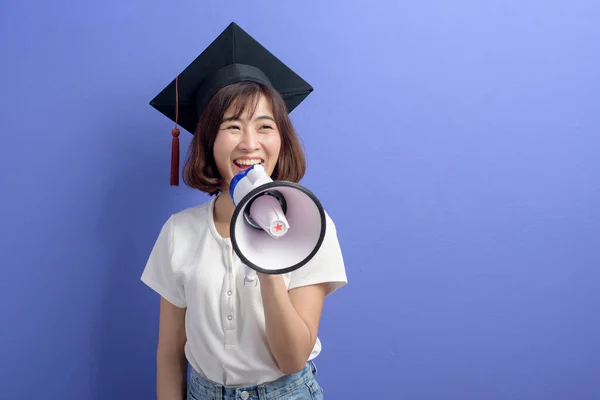 Portrait Graduated Asian Student Holding Megaphone Isolated Purple Background Studio — Stock Photo, Image