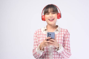A young beautiful woman wearing headset on white background