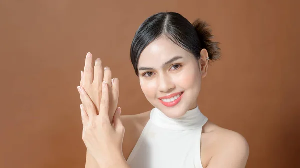 Close Young Woman Hand Applying Cream Brown Background Beauty Skin — Photo