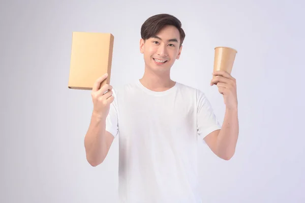 Young Asian Man Holding Paper Cup Paper Box White Background — Zdjęcie stockowe
