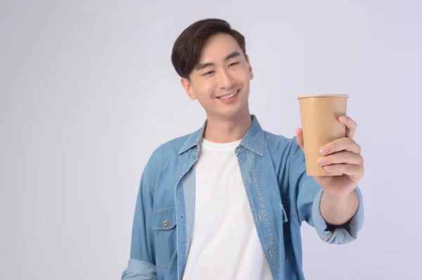 Young Asian Man Holding Paper Cup White Background Earth Concept — Zdjęcie stockowe
