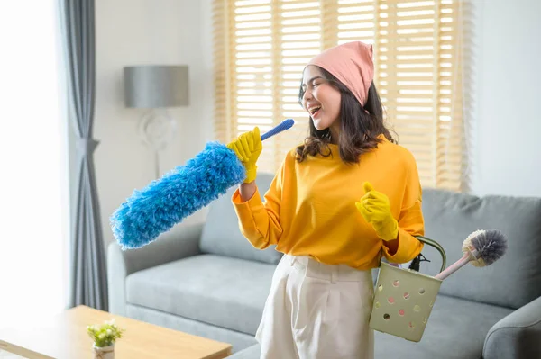 Young Happy Woman Wearing Yellow Gloves Holding Basket Cleaning Supplies — Stockfoto