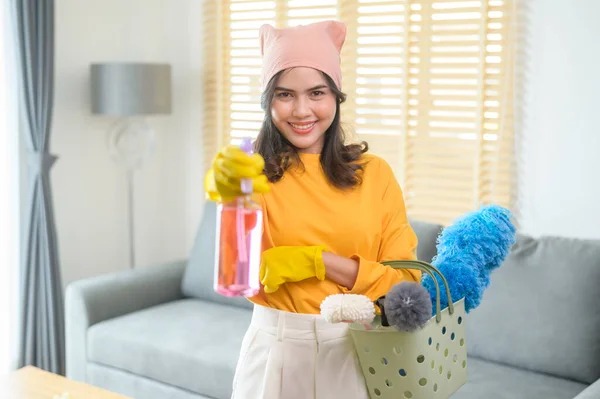 Young Happy Woman Wearing Yellow Gloves Holding Basket Cleaning Supplies — Stock fotografie