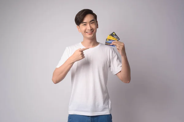 Young Asian Man Holding Credit Card White Background Studio Shopping — Stock Photo, Image