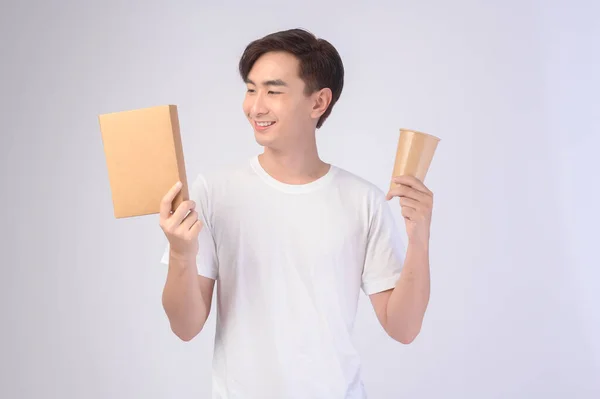 Young Asian Man Holding Paper Cup Paper Box White Background — Stok fotoğraf