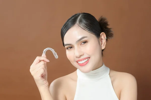 Young Woman Beautiful Teeth Holding Invisalign Healthy Dental Concept —  Fotos de Stock