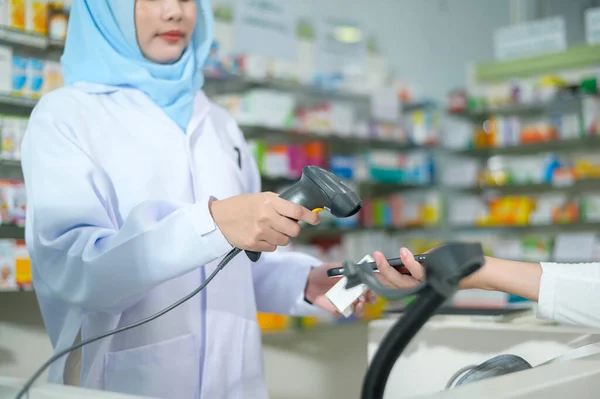 Female Muslim Pharmacist Scanning Barcode Modern Pharmacy Drugstore — Foto de Stock
