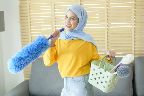 Young Happy Muslim Woman Wearing Yellow Gloves Holding Basket Cleaning — Stockfoto