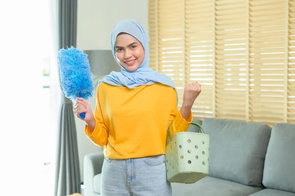 Young Happy Muslim Woman Wearing Yellow Gloves Holding Basket Cleaning — Stok Foto