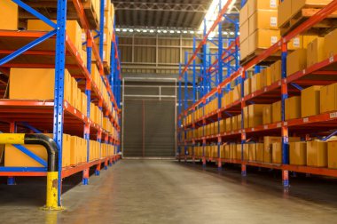 Inventory full of shelves in modern warehouse storage of retail shop.