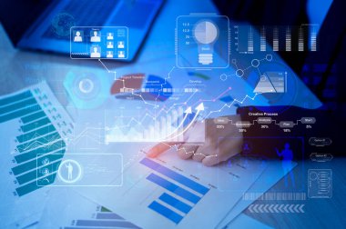 Background of documents with analytics data lying on table 