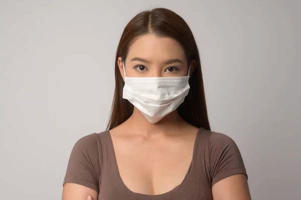 Young Asian Woman Wearing Protective Mask White Background Studio Safety — Stock Fotó