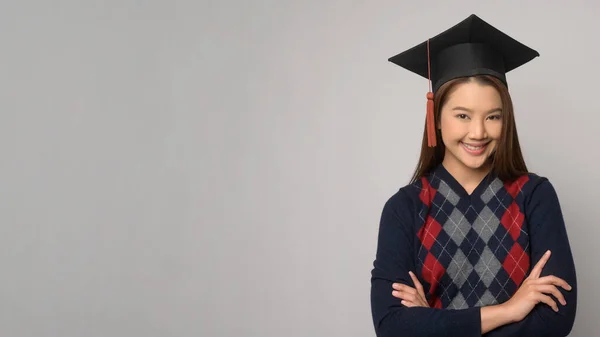 Young Smiling Woman Holding Graduation Hat Education University Concept — Stok fotoğraf