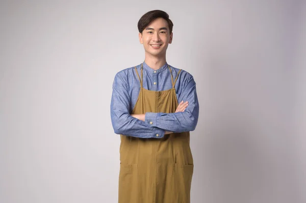 Portrait Young Asian Man Wearing Apron White Background Studio Cooking — Stok fotoğraf