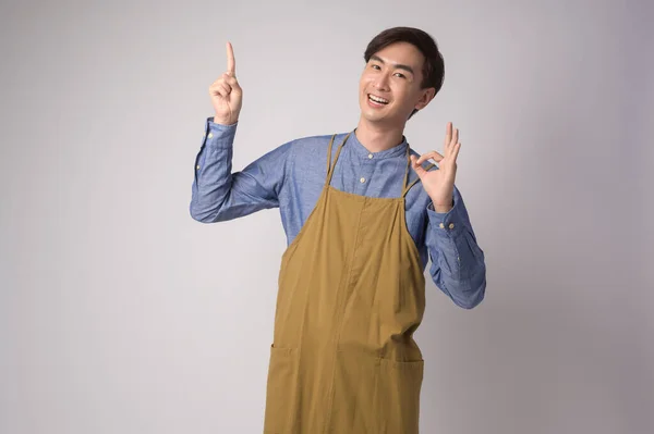 Portrait Young Asian Man Wearing Apron White Background Studio Cooking — Stock Fotó