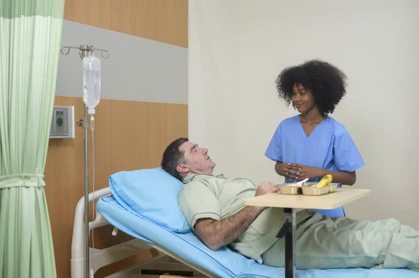 Woman Mixed Race Nurse Working Hospital Take Care Adult Male — Stock Photo, Image