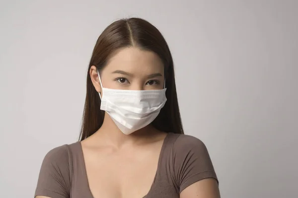 Young Asian Woman Wearing Protective Mask White Background Studio Safety — Stock Fotó