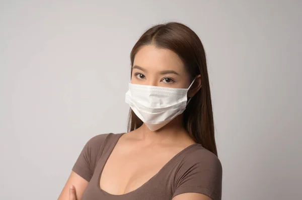 Young Asian Woman Wearing Protective Mask White Background Studio Safety — Stock Fotó