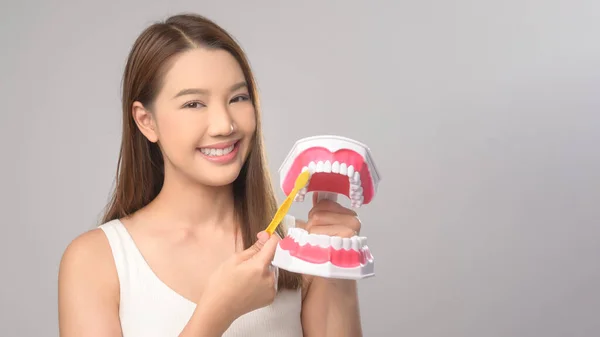 Young Smiling Woman Holding Toothbrush White Background Studio Dental Healthcare — Foto de Stock
