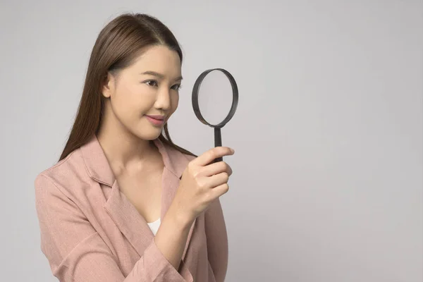 Young Asian Woman Holding Magnifying Glass White Background Analysis Finance — Stock Fotó