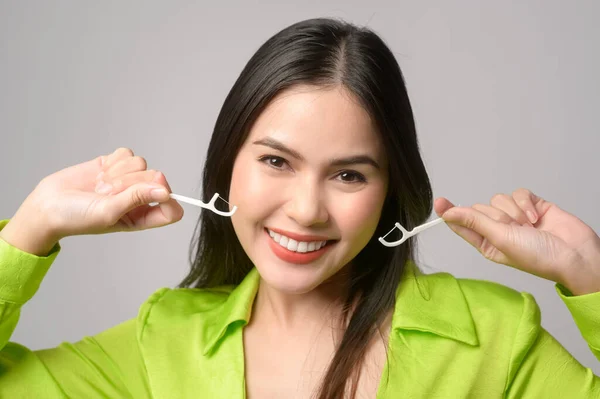 Young Smiling Woman Holding Dental Floss White Background Studio Dental — Stockfoto