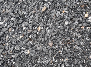 Çakıl taşları dokusu arka plan. Ezilmiş kayaya yakın çekim, inşaat endüstrisi için taş hammadde. arkaplan ve doku kavramı.